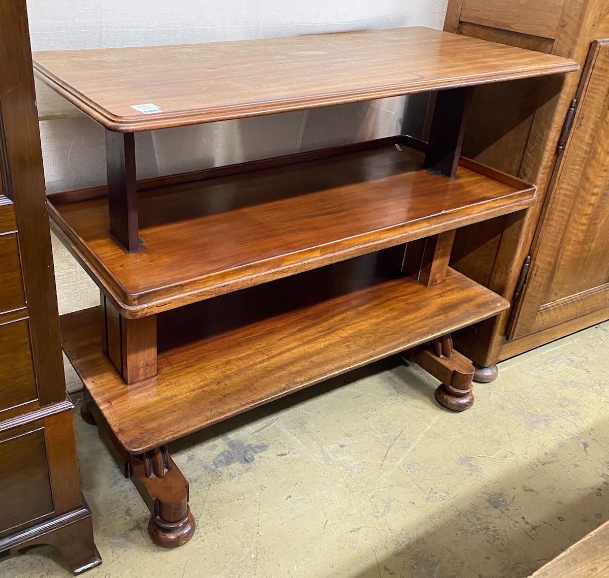 A mid Victorian mahogany metamorphic three tier buffet, width 121cm, depth 54cm height 104cm extended.